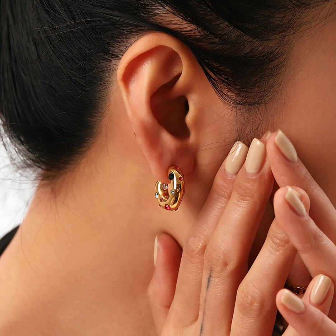 A single green leaf against a white background.