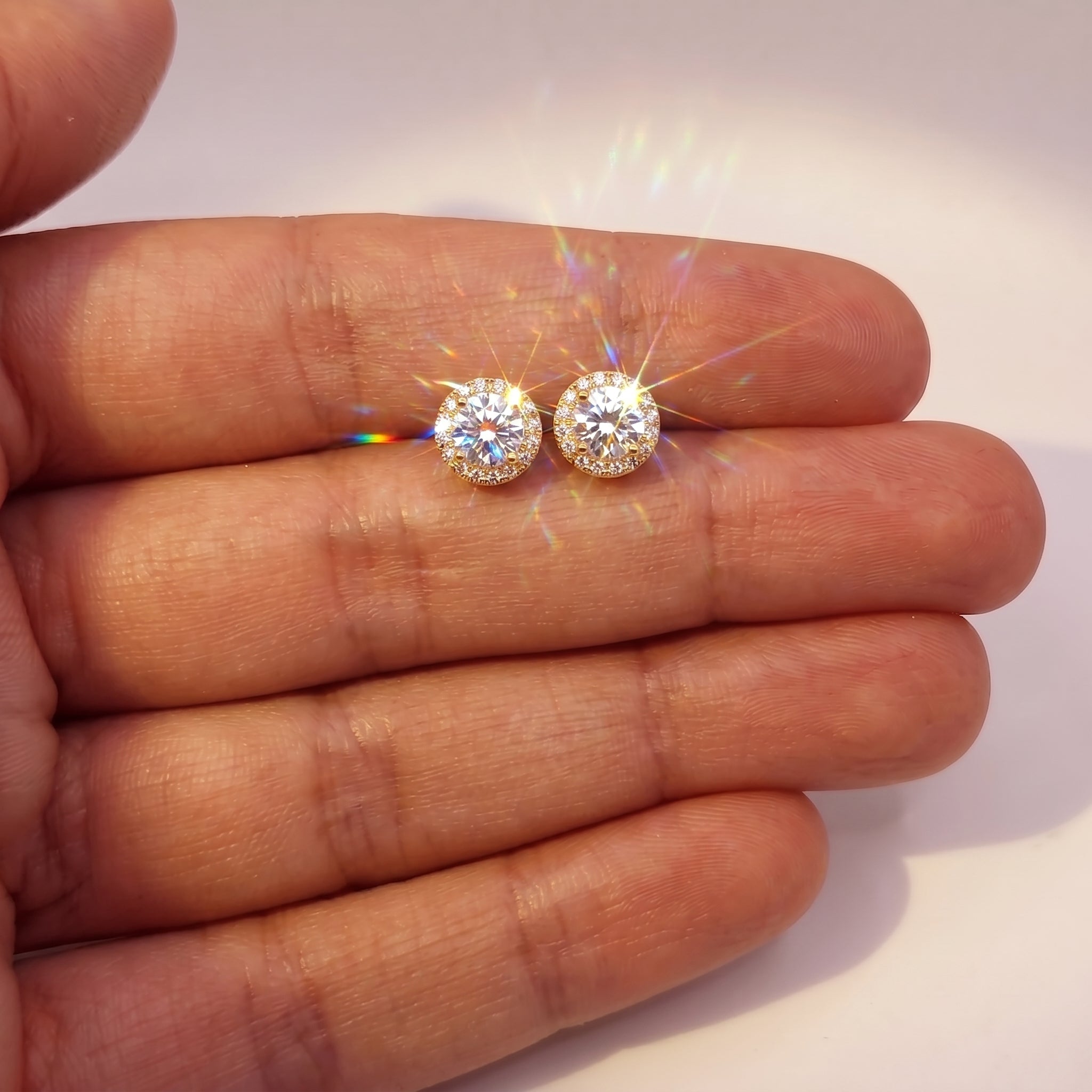 A single green leaf against a white background.